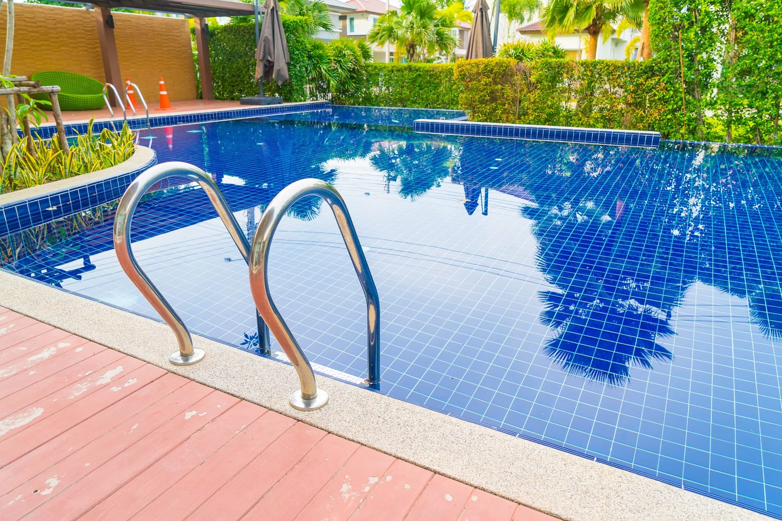 A stair entry into a swimming pool at a residential property